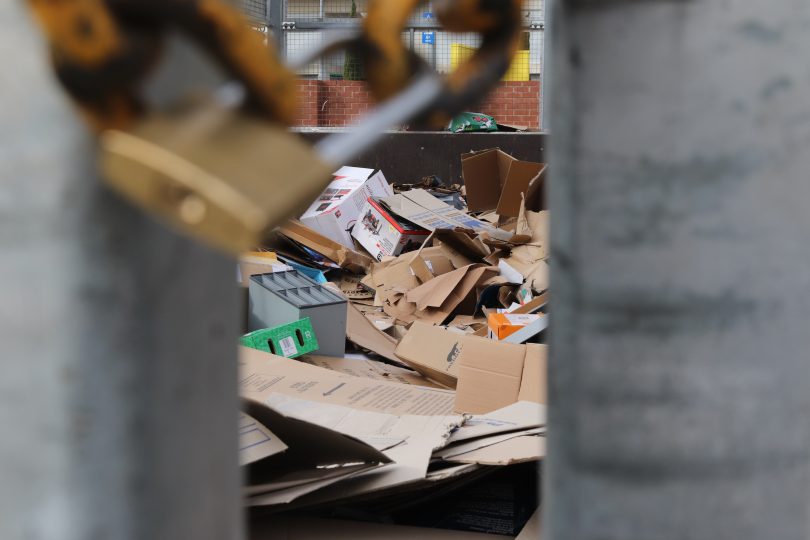 A padlock on the Gungahlin Recycling Centre cardboard cage