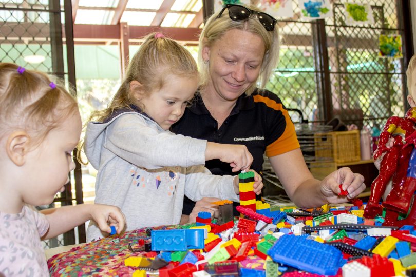 Communities@Work educator with children