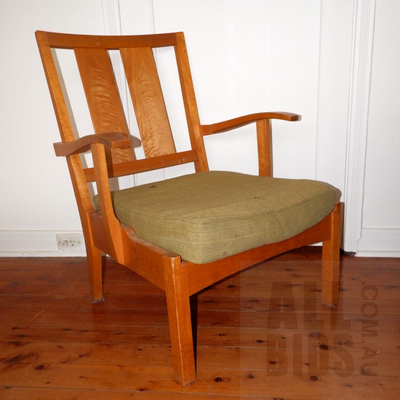 Wooden chair on wooden floor.