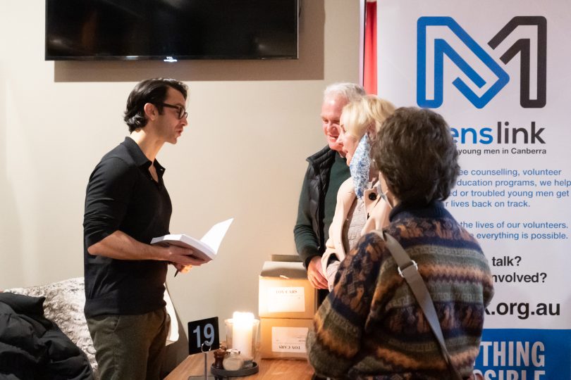 Nathan Spiteri talking to a group of people at Menslink Midweeker event