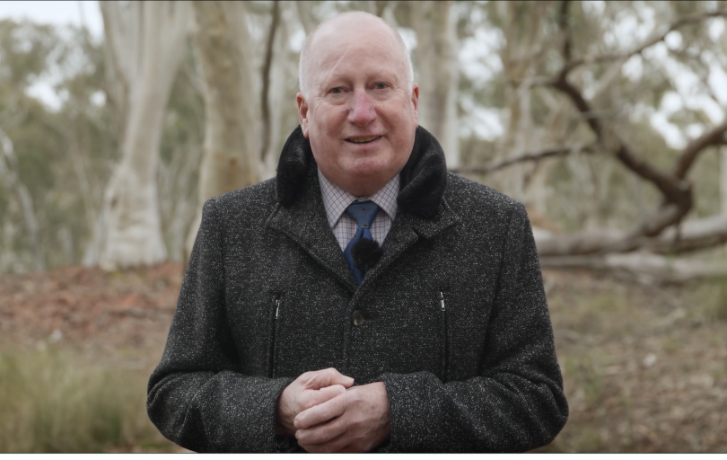 ACT Minister for Planning and Land Management Mick Gentleman standing in bushland