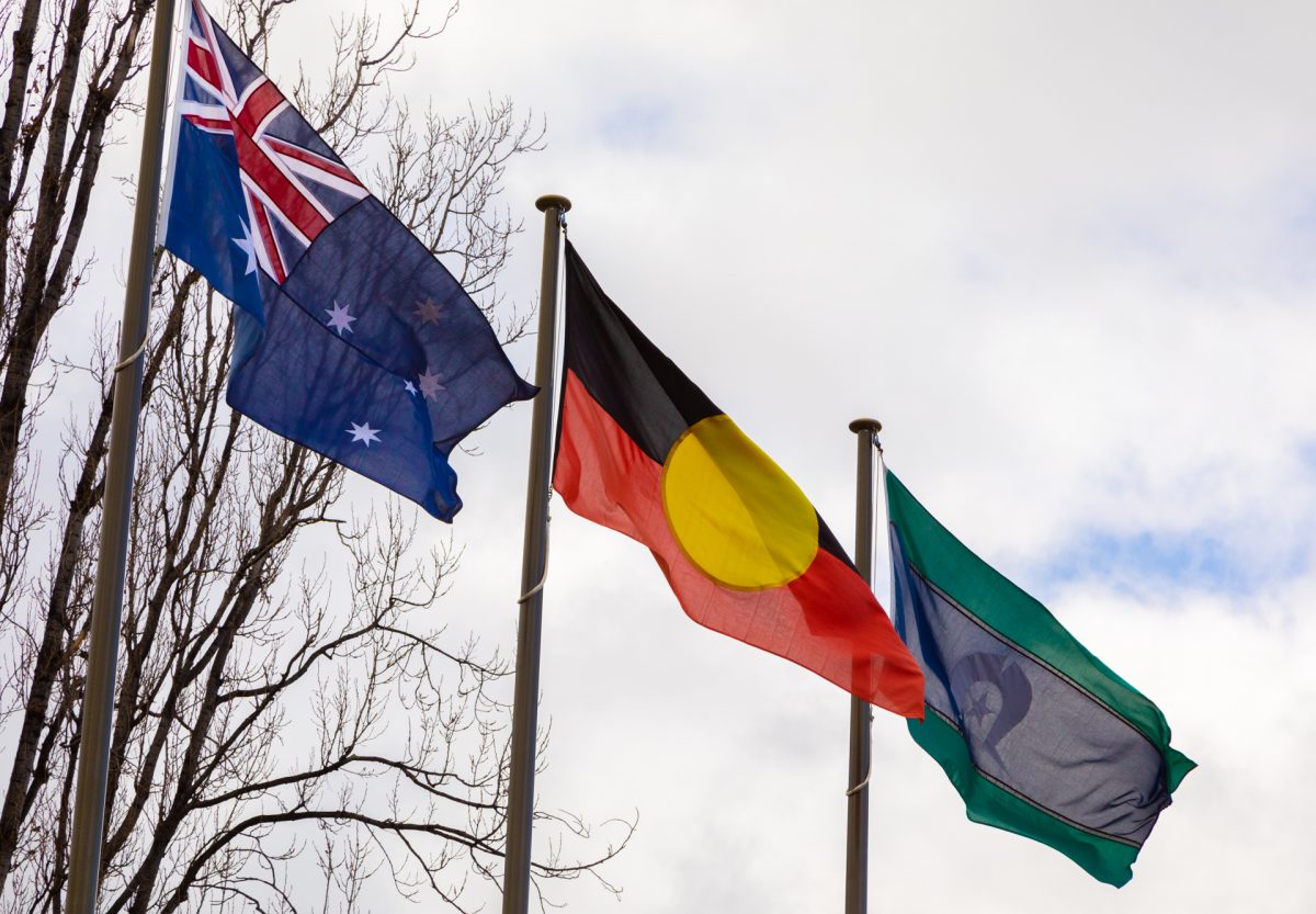 Australian flag, Australian Aboriginal flag, Torres Strait Islander flag on poles