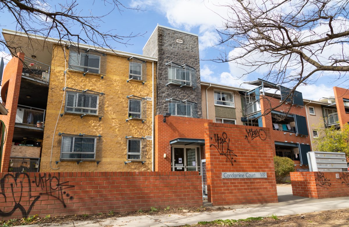 Apartment building with graffiti