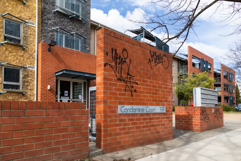 Apartment building with graffiti