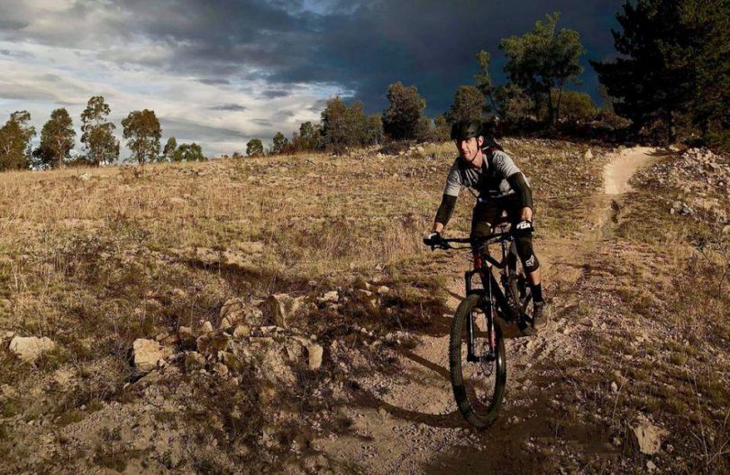 Jonathon Colbran riding mountain bike