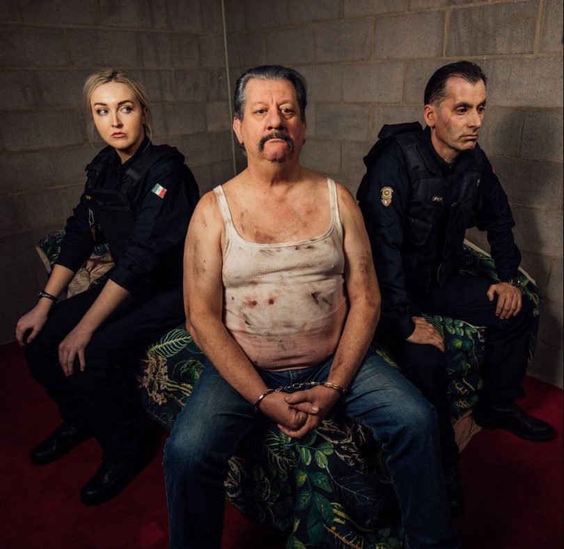 Two police officers and 'El Ticho' from production '20 Minutes With the Devil'