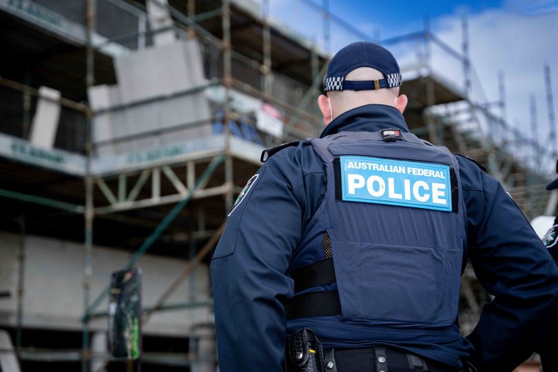 Police officer on a construction site