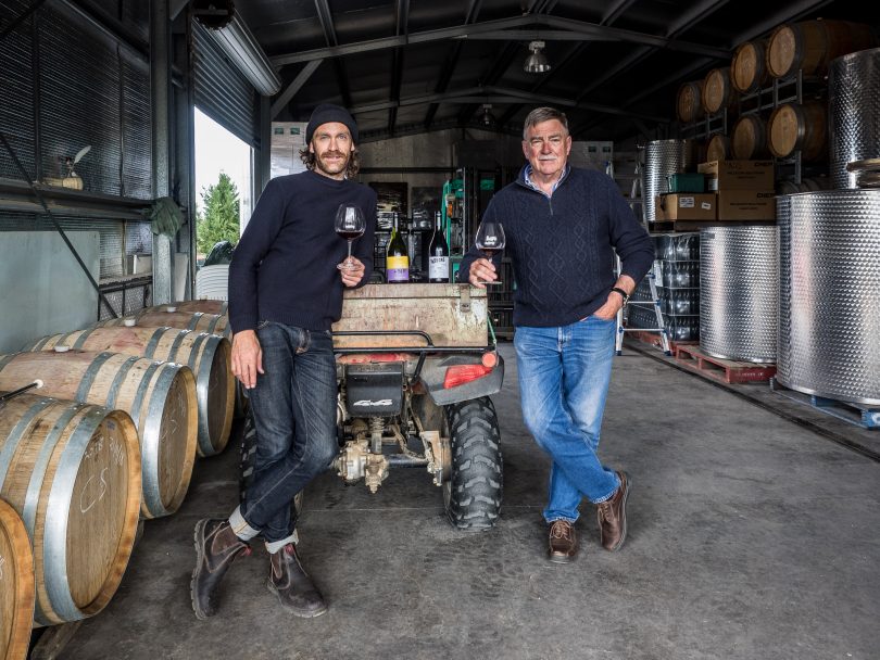 Two men in a shed