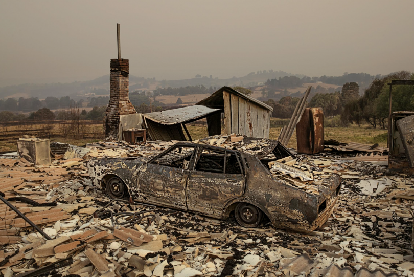 Burnt down house and car