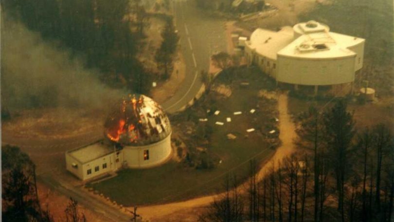 Yale Columbia dome on fire at Mount Stromlo during Canberra bushfires in 2003