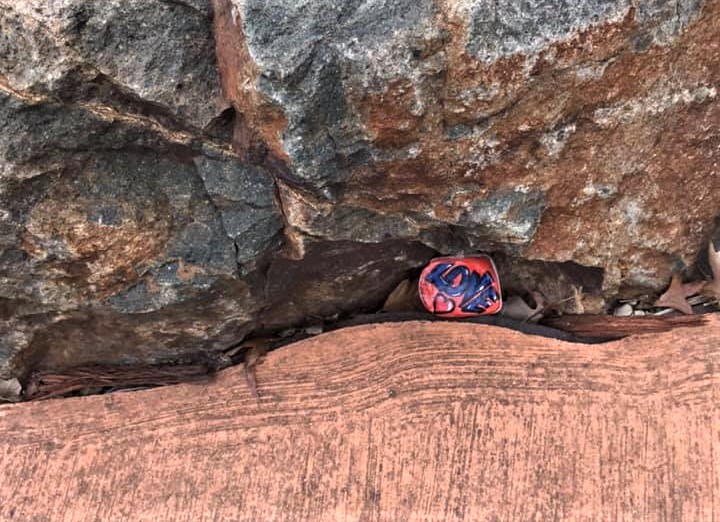 Painted rock with 'love' on it