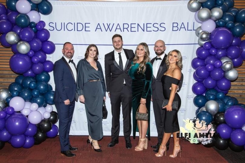 Peter Chamberlain (left) and the Allinsure team at the 2021 Suicide Awareness Ball which raised funds for OzTeam. 