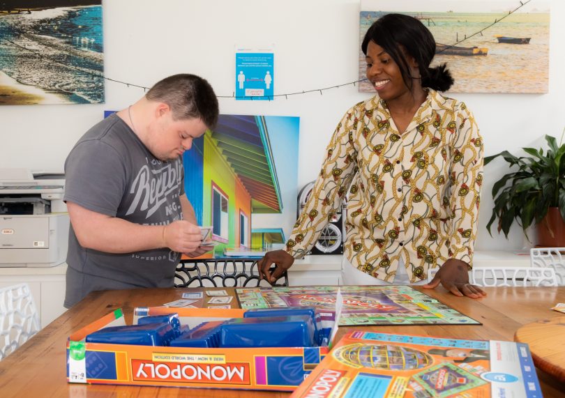 two people plating monopoly