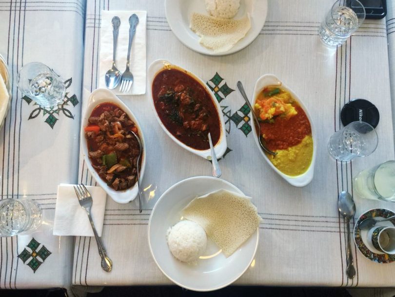 Lamb tibbs, beef wat and lentil combination