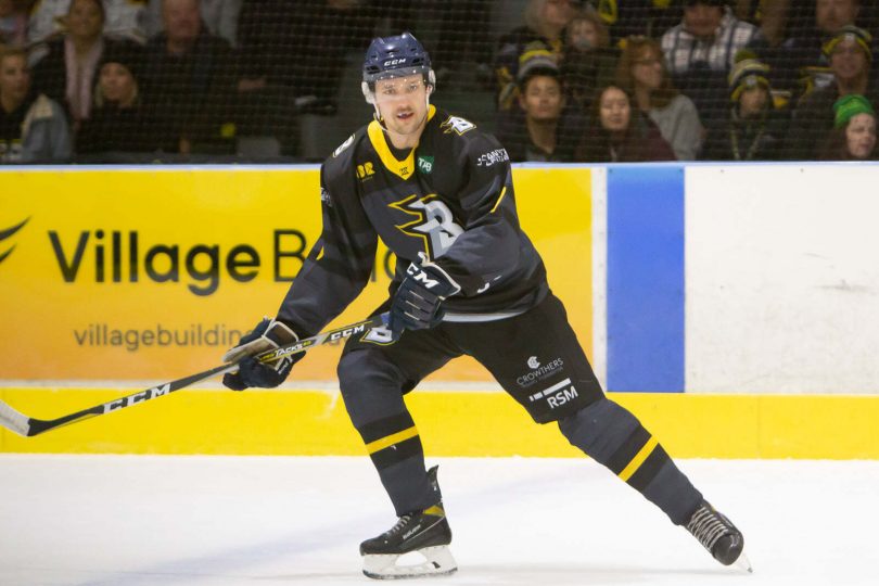 Bayley Kubara playing ice hockey for CBR Brave