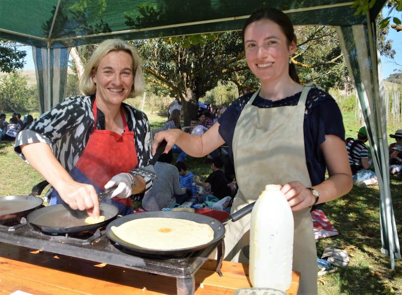 Two women cooking