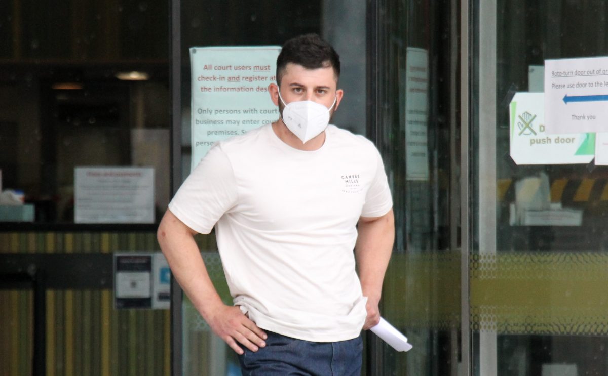 man is mask outside court