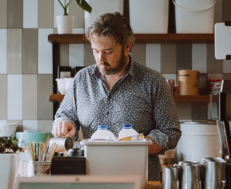 Ryan Jennings making coffee