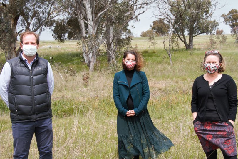 Ian Walker, Rebecca Vassarotti and Helen Oakey standing in grassland