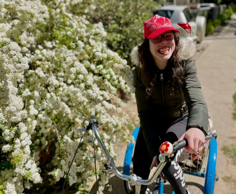 Mikayla Paine on tricycle