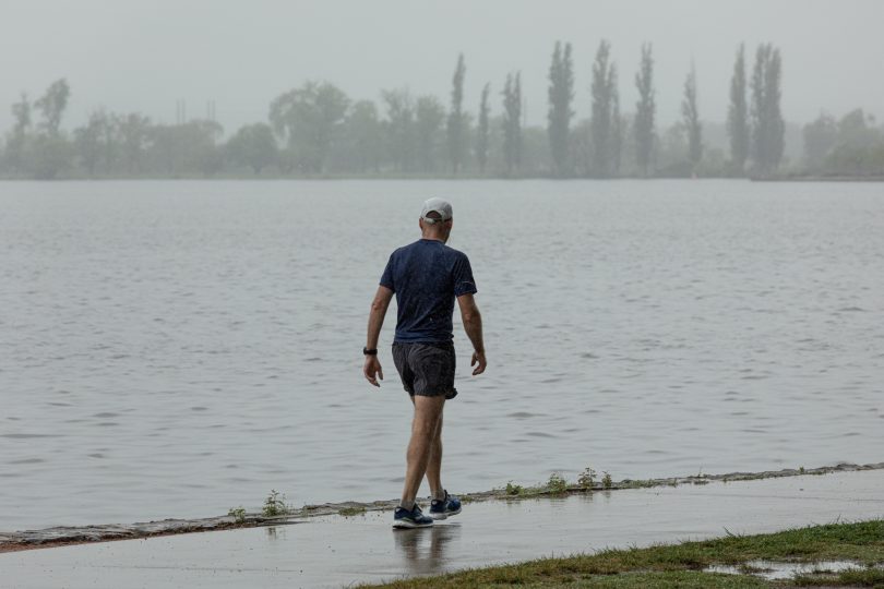 Man exercising in the rain