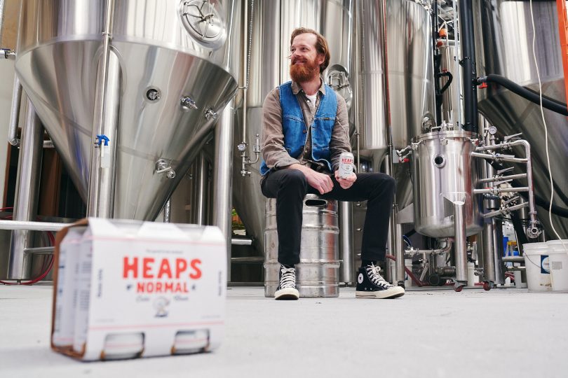 Man in brewery with beer