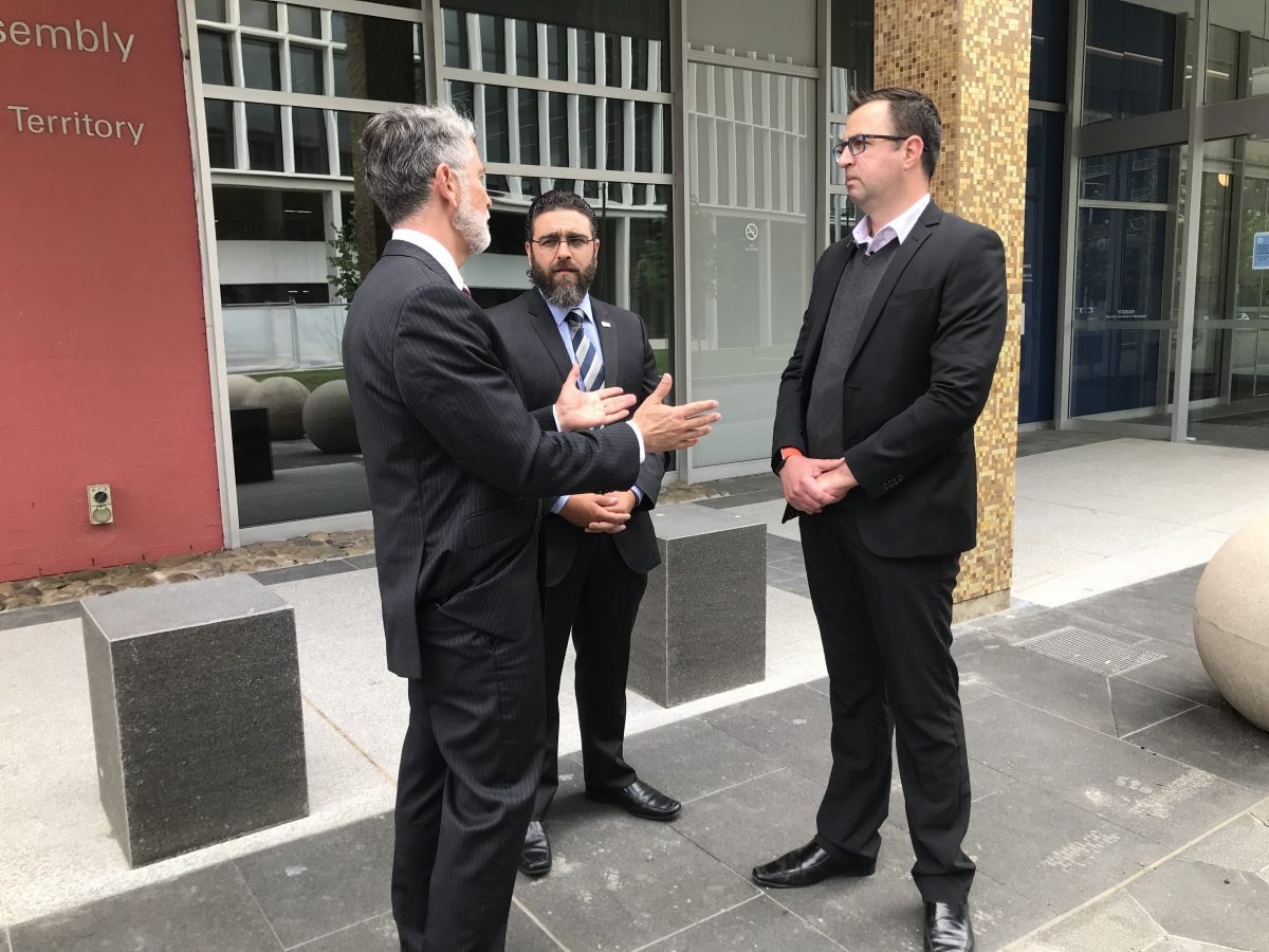 Opposition spokesperson on police Jeremy Hanson, AFPA president Alex Caruana and former police officer Jason Taylor.