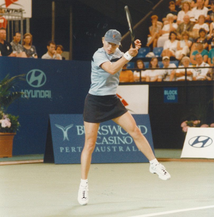 Annabel Ellwood playing professional tennis