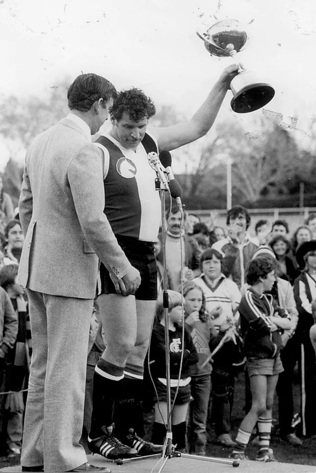 Kevin Neale holding trophy after 1980 AFL Canberra grand final