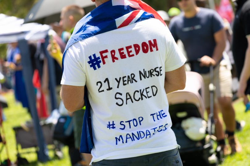 Man with flag over shoulders