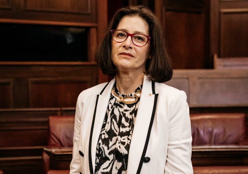 woman in white suit