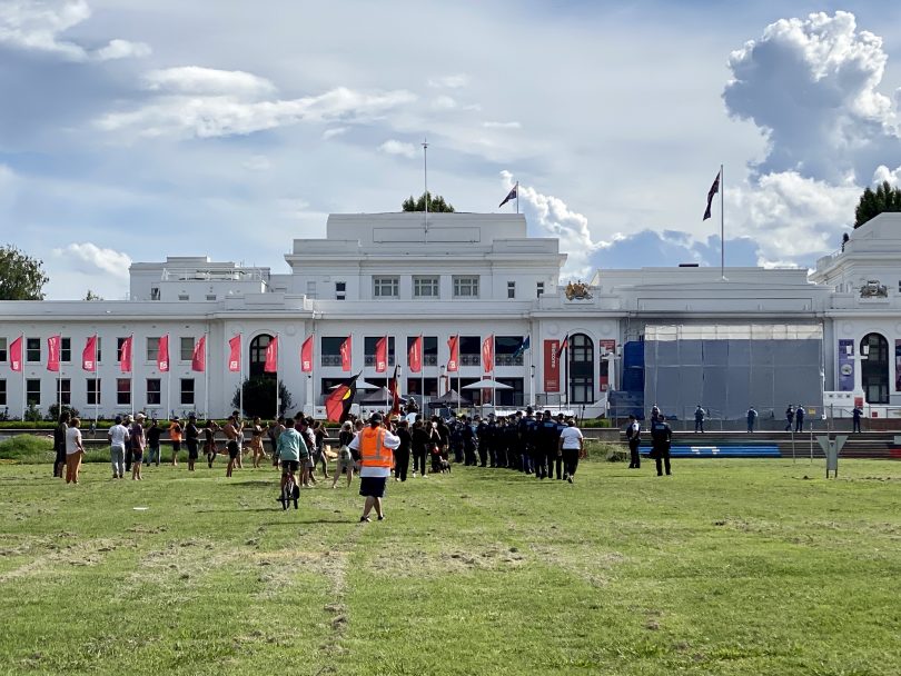 Police and protesters outside Old Parliament House