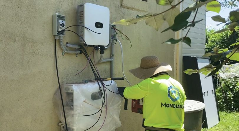 Mondiaux Solar worker installing HUAWEI inverter and battery