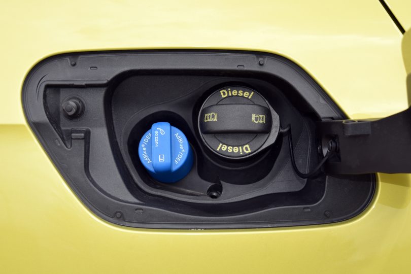 Diesel and AdBlue tank caps on car