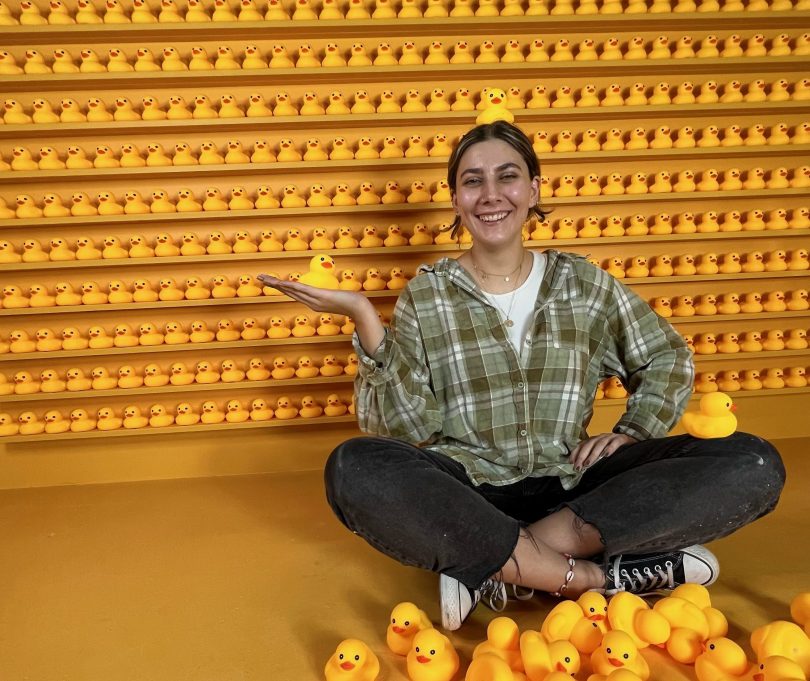 Alyssa Catelli with rubber ducks at Canberra's Selfie Museum