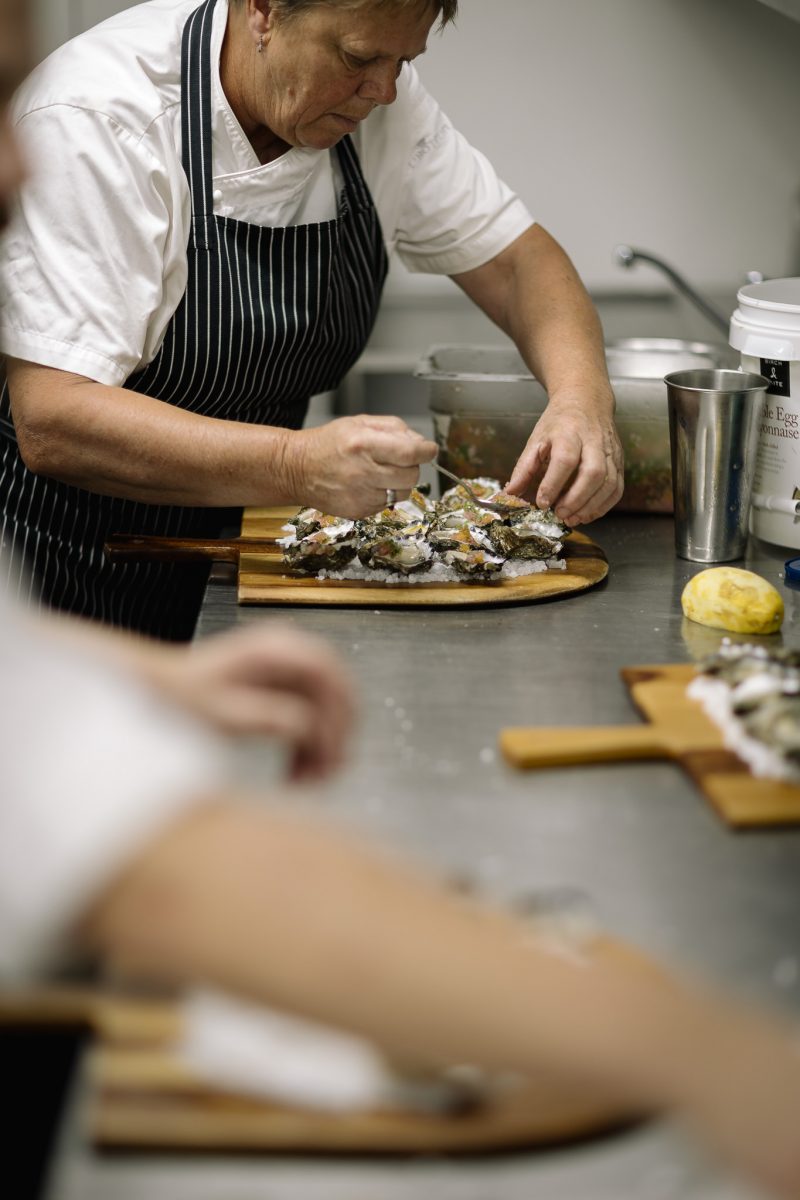 Chef plates up a dish