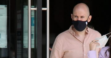 Former plumber sentenced for assaulting journalist outside Canberra courts
