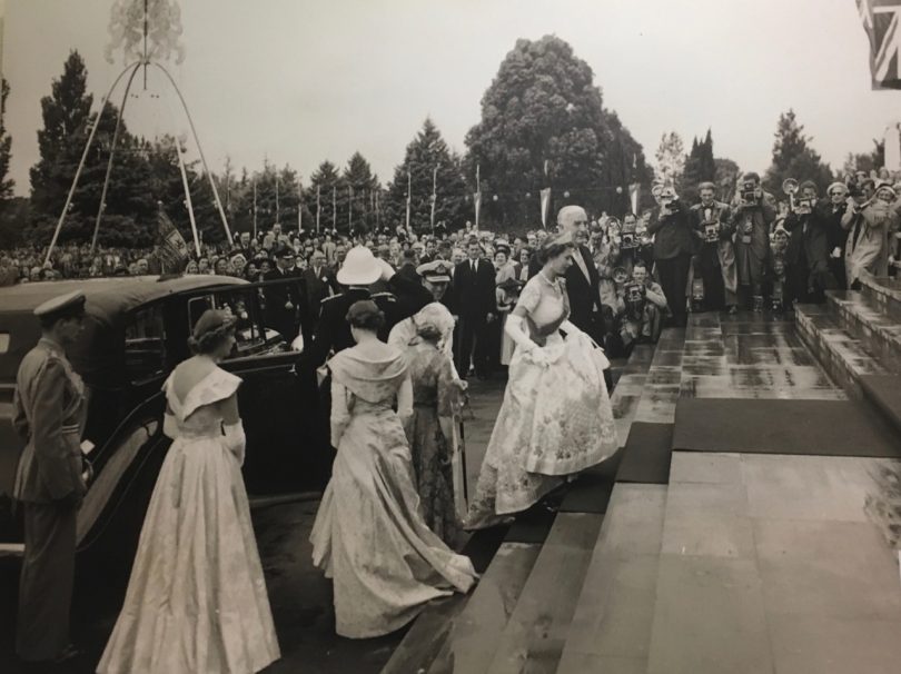 Pictured here the Queen is entering Provisional Parliament House for the opening of the third session of the 20th Commonwealth Parliament. Note the formality of the occasion. This image is part of the exhibition, 'Happy and Glorious' documenting the Queen's visit to Canberra, at the Museum of Australian Democracy at Old Parliament House. 