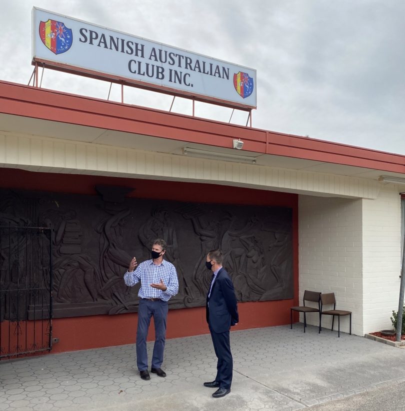 Spanish Australian Club treasurer Chris Lander pictured with Minister for Gaming Shane Rattenbury outside the club