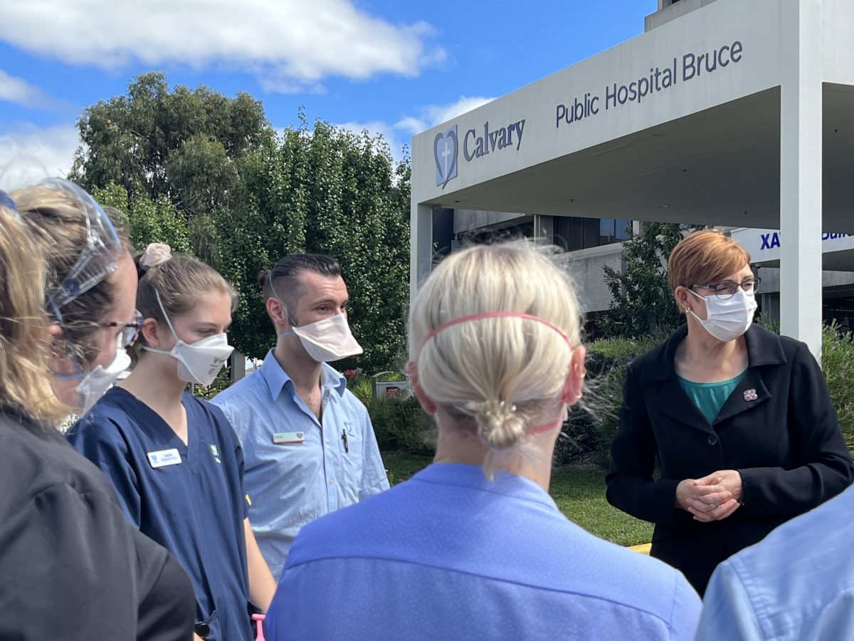 Rachel Stephen-smith surrounded by nurses