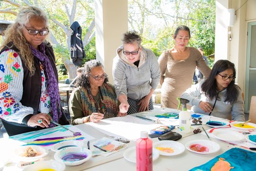 Five women painting