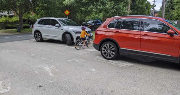 Lyneham kids face 'stomach-flipping' journey to school due to car park placement