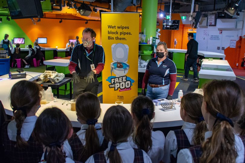 Children gathering at a display at Questacon