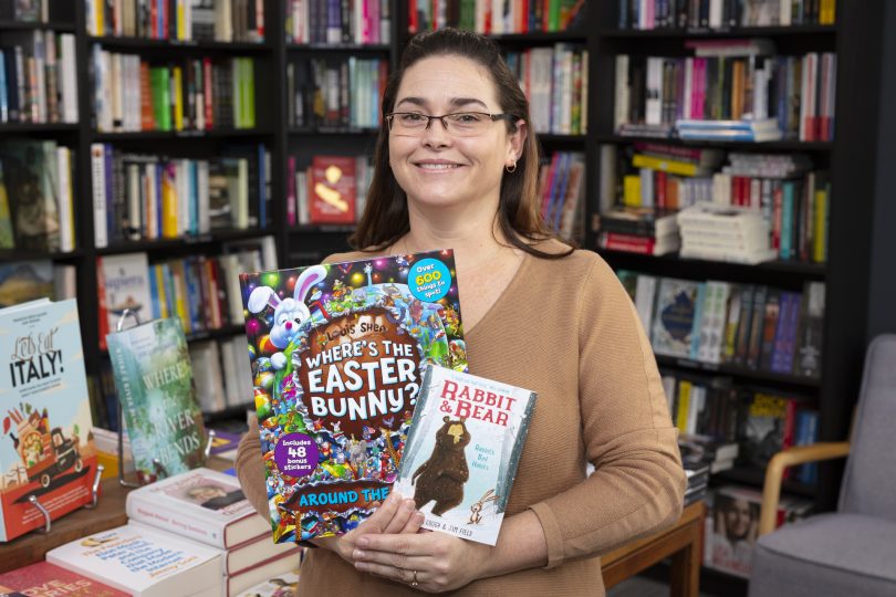 Woman holding books