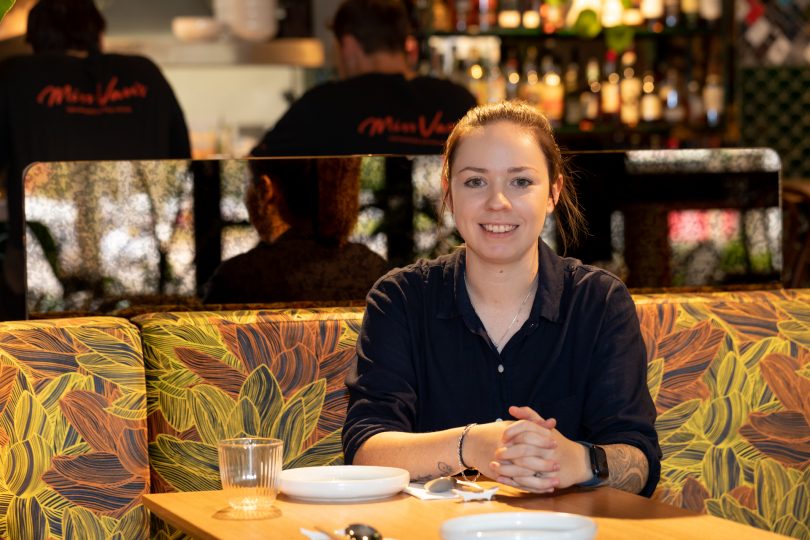 Woman seated in restaurant