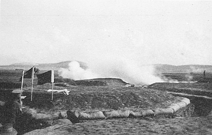 Smoke rises in an historic image of the Duntroon Instructional Trench System. 