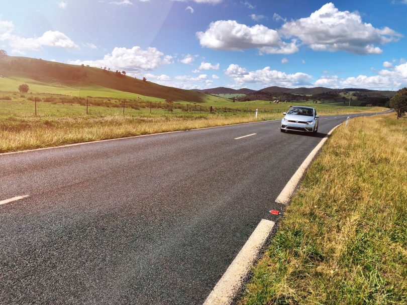 Car driving on Tidbinbilla Road