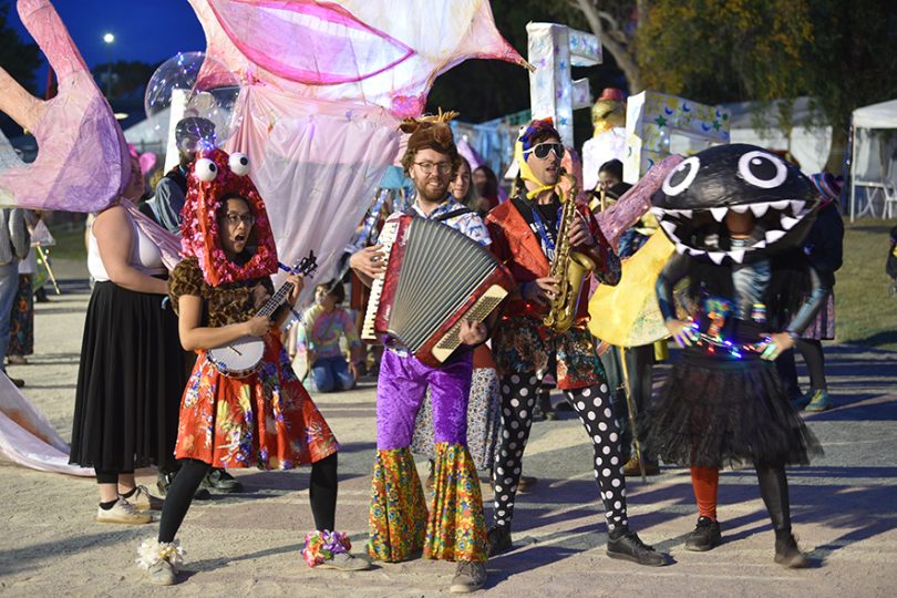 Group of performers in a parade at folk festival