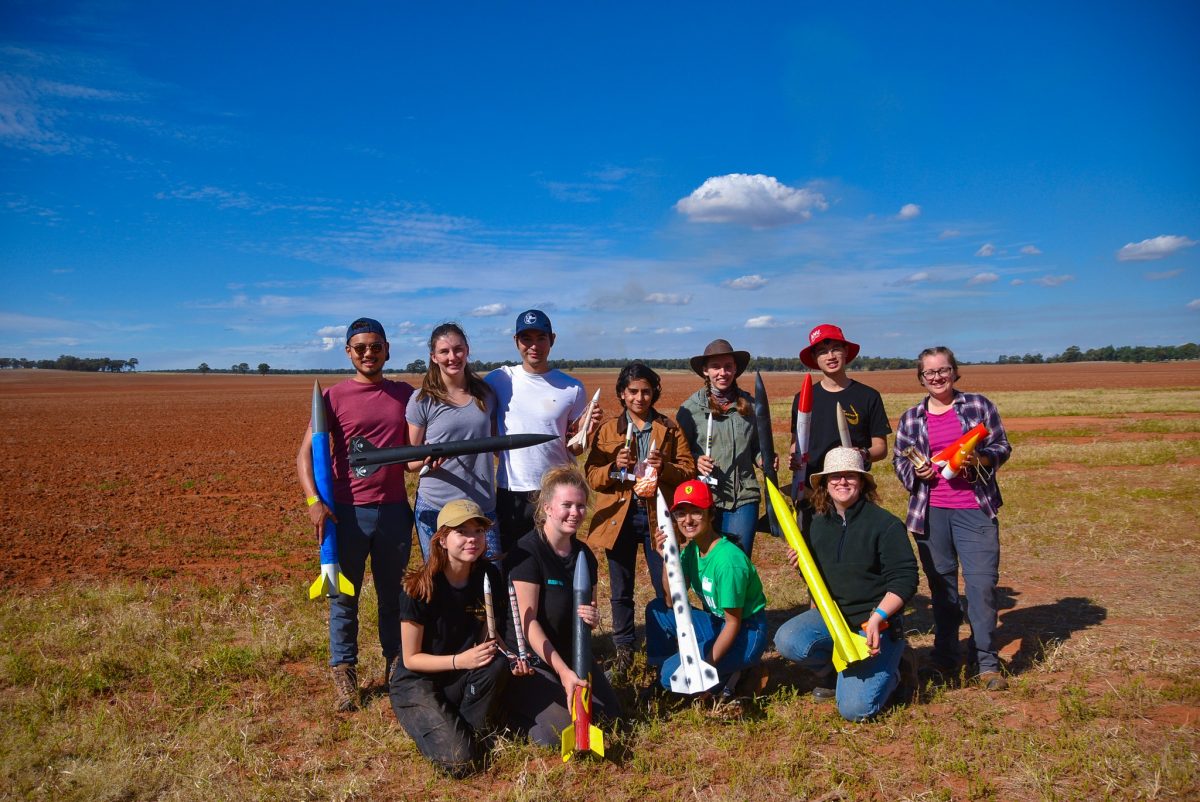 ANU students in a paddock