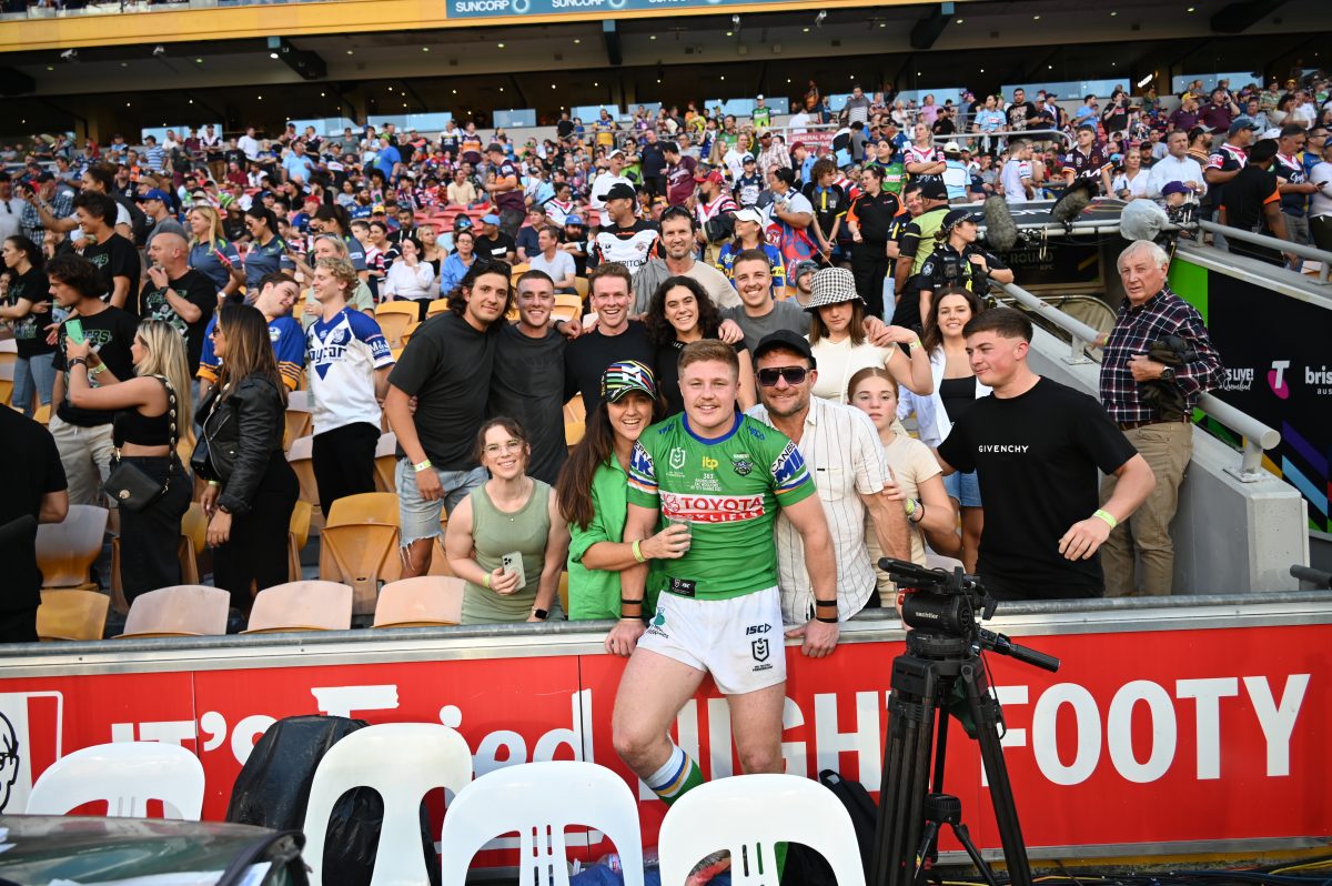 Zac Woolford with his family after his debut NRL game